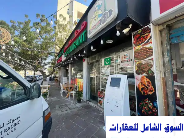 فرصة استثمارية ذهبية في عجمان: محلات تجارية، مغسلتي سيارات كبيرتين، وسكن عمال بالرميلة - دخل سنوي 192 ألف وتصريح G+6!