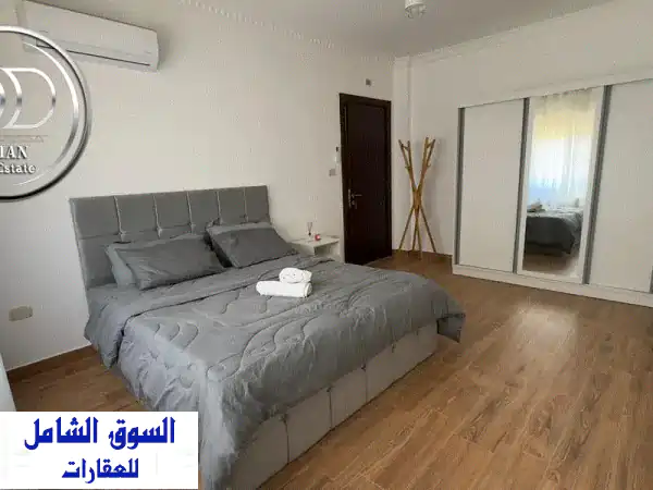 شقة فاخرة مفروشة للإيجار بالدوار السابع | 100م قرب السيفوي | تشطيب فندقي وإطلالة ساحرة
