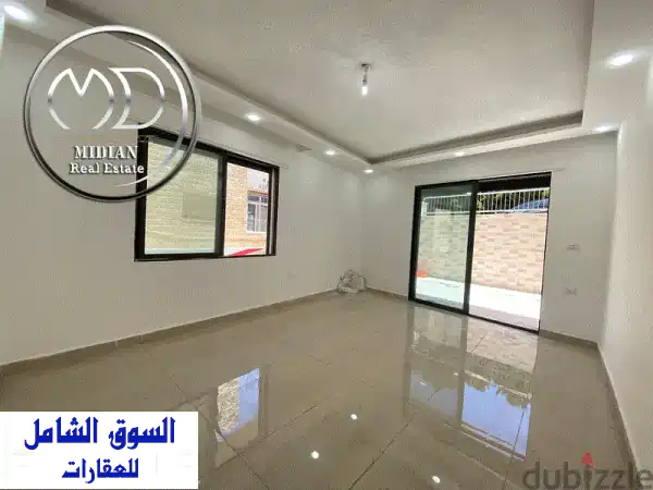 شقة شبه أرضي جديدة للبيع خلدا مساحة 125 م مع ترس 30...