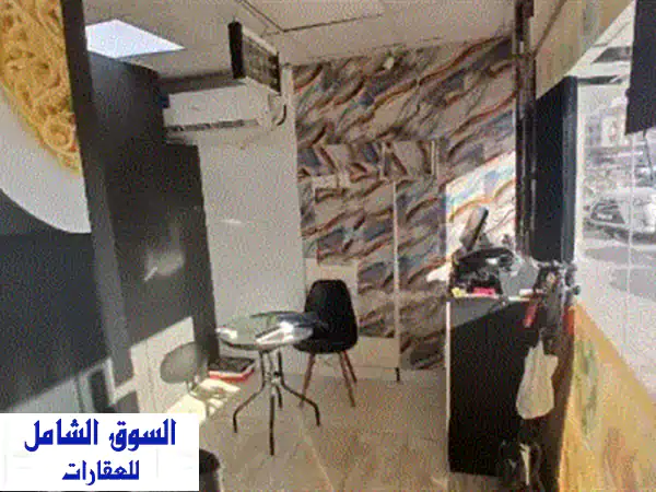 فرصة استثمارية ذهبية: كفيتيريا مجهزة بالكامل للبيع في عجمان - الروضة 2 (شارع تونس) - جاهزة للعمل ومربحة!
