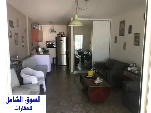 شاليه للبيع في تنورين الفوقا | 45م² ملاذ جبلي بإطلالة بانورامية | استثمار وطبيعة
