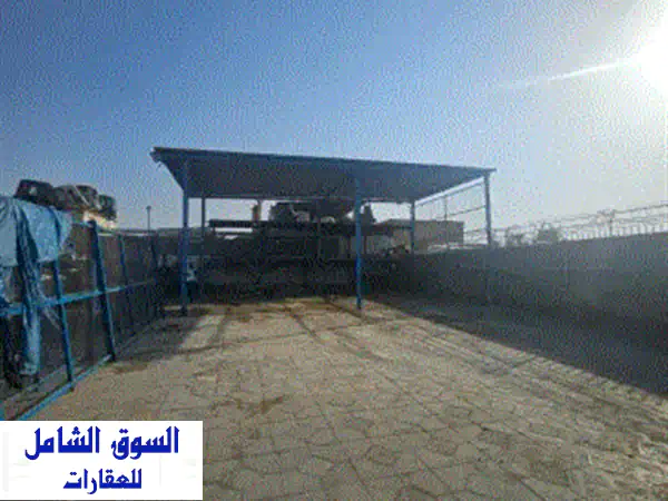 زاوية مميز مناسب للشاحنات والسيارات فرصة مميزة لاستئجار كراج بموقع حيوي في الصناعية، مناسب لأعمال ...
