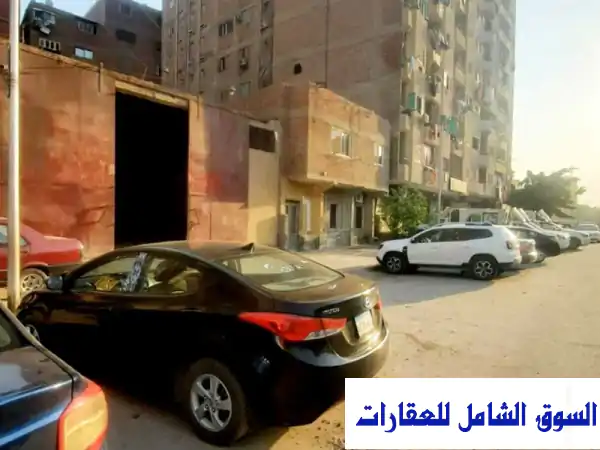 مخزن 950 م بة مبنى خدمي دورين في موقع متميز للإيجار...