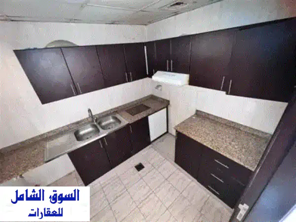 شقتك المثالية في عجمان! 🔑 غرفة وصالة للإيجار السنوي بالحميدية - قرب الجامعة والمحكمة | 26 ألف درهم فقط!