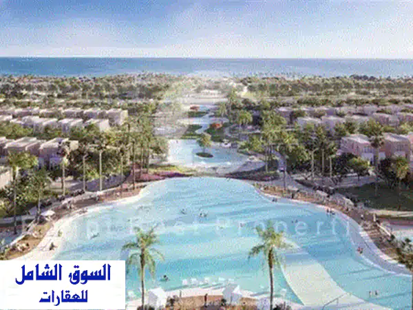 شاليه 3 غرف نوم للبيع فى طرح جديد بحديقه خاصه باطلاله مميزه على البحر بافضل تقسيمه فى اوجامى فى راس الحكمه فى الساحل الشمالى 2