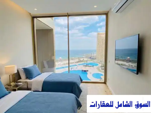 شقة فندقية فاخرة للإيجار ببورتو السخنة | هرم خفرع | إطلالة بحرية مباشرة وجاكوزي | من المالك