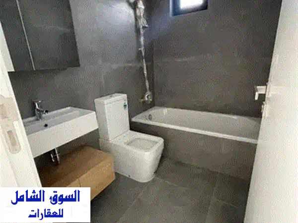 فرصة ذهبية: شقة فاخرة جديدة للبيع في ضبيه 113م بإطلالة مفتوحة وموقفين! 3
