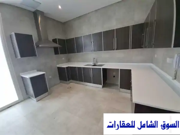 استمتع بالرفاهية: شقة فسيحة ومودرن للإيجار بالروضة (دور أول) 3 ماستر، بلكونة وإطلالة خلابة!