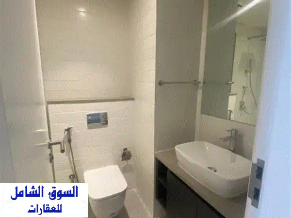 استوديو فاخر للبيع بالممشى الشارقة: فرصتك للسكن الراقي والاستثمار المربح!