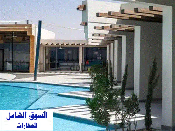 فرصة لا تُعوّض: شاليه دبل فيو 105م استلام قريب في دايركشن وايت راس الحكمة - تشطيبات فاخرة وتكييفات! 4