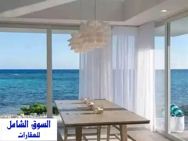 2 د الي  قلب البحر شاليه متشطب vip  فيو خيالي بانورامي  خطوات للبحر في اميز لوكيشن في القريه شاليه استثمار مضمون طوال السنه بعائد لايقل عن 70 الف