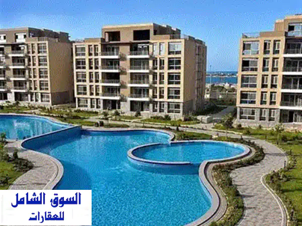 شاليه للبيع فيو خيالي علي lagoon و دقيقه من البحر في مارينا 8 في الساحل الشمالي 2