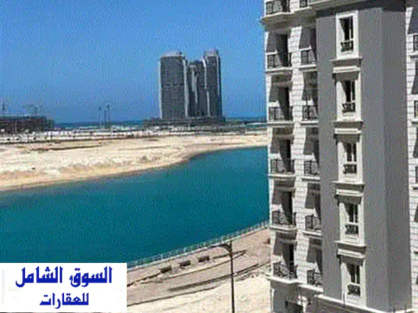 استلم فوري بحري دايركت لاجون  شقة متشطبة 174 م للبيع في الحي اللاتيني العلمين الساحل الشمالي قبل مارينا 7 ومراسي Latin Alamein North Coast 2