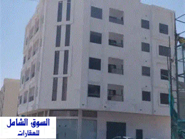 فرصة استثمارية ذهبية: بناية سكنية تجارية زاوية...