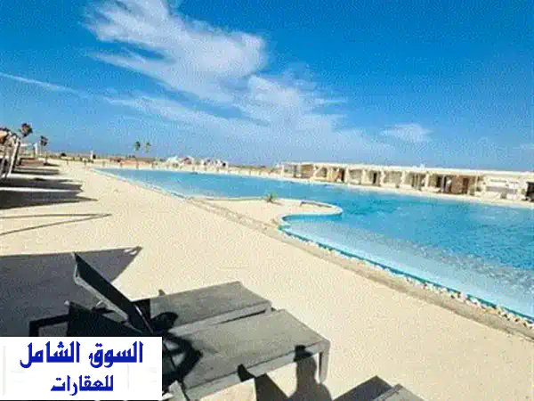شاليه في قلب البحر استلام متشطب بالتكيفات  وفيو بانورامي علي البحر 2 د مشي للبحر دقائق الي مطار العلمين الجديد The Waterway+lavista 2