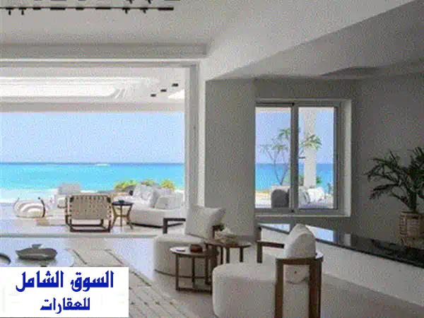 فيلا OneStory بخصم 30  صف اول خطوتين للبحر للبيع  في اوجامي سوديك ogami sodic  north coast  راس الحكمه بجوار فوكا باى وماونتن فيو ولافيستا