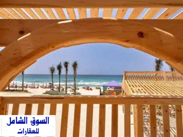شاليه  استلام فوري تشطيب بالكامل للبيع بسعر مميز بفيو البحر داخل كالي كوست في الساحل الشمالي راس الحكمه 3