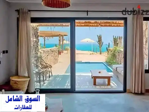 شاليه  استلام فوري تشطيب بالكامل للبيع بسعر مميز بفيو البحر داخل كالي كوست في الساحل الشمالي راس الحكمه