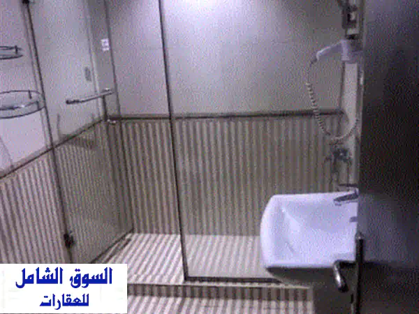 فرصة ذهبية! 32 شقة مفروشة راقية للإيجار في شارع المعارض، البحرين | شاملة الكهرباء بـ 250 د.ب. فقط!