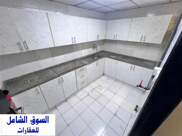 فرصة ذهبية: شقة غرفة وصالة واسعة للإيجار في المويهات 3، عجمان | بـ 20,000 درهم فقط!