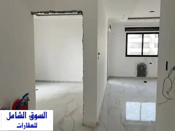 شقة ارضية طريق المطار خلف المدارس العالمية خربة خليفة تشطيب مميز