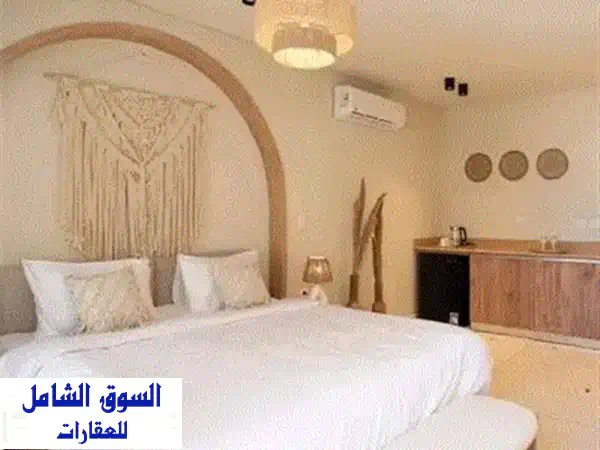 شاليه صف أول لاجون Sea View  من مصطبـة 33 م  متشطب بجوار هاسيندا باي للبيع في سي شور هايد بارك الساحل الشمالي راس الحكمة Seashore Hyde Park North Coast 3