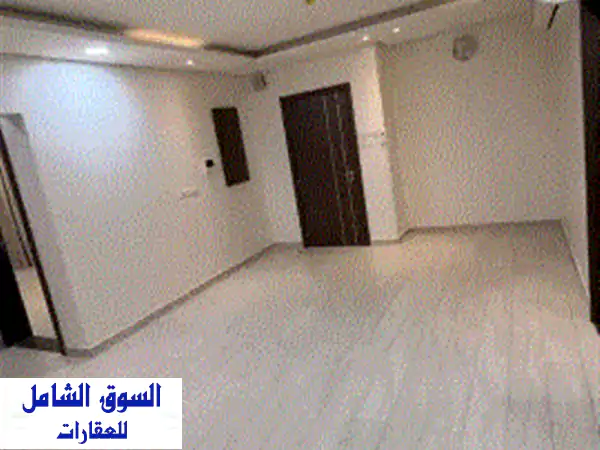 شقة فاخرة نصف مفروشة للإيجار في منطقة توبلي، تتكون من ثلاث غرف نوم وحمامين ومطبخ وصالة ومصعد وموقف ... 3