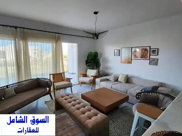 شاليه استلام فوري دبل فيو على البحر والاجون تشطيب بالمطبخ والتكيفات فى دايركشن وايت سورفى سور مع جون سوديك و كالي كوست راس الحكمهDirection White