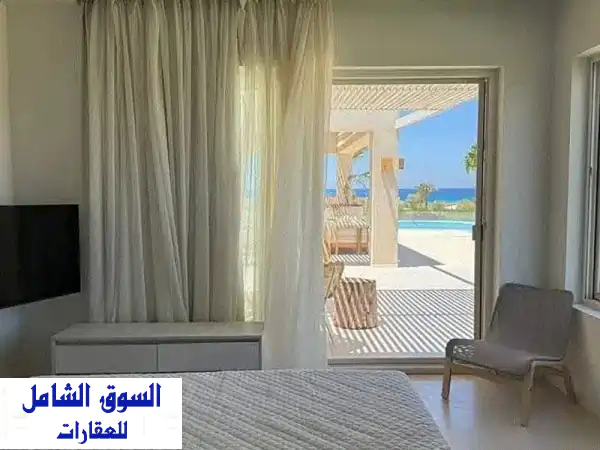 شاليه صف أول لاجون Sea View  من مصطبـة 33 م  متشطب بجوار هاسيندا باي للبيع في سي شور هايد بارك الساحل الشمالي راس الحكمة Seashore Hyde Park North Coast