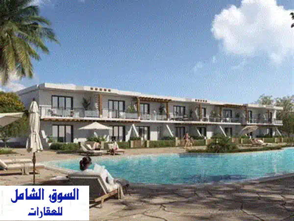 شاليه استلام فوري دبل فيو على البحر والاجون تشطيب بالمطبخ والتكيفات فى دايركشن وايت سورفى سور مع جون سوديك و كالي كوست راس الحكمهDirection White 4