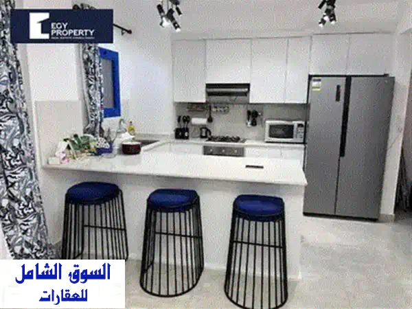 شاليه للبيع في مراسي الساحل الشمالي فيو  حمام سباحه  مفروش بالكامل باقل سعر 3