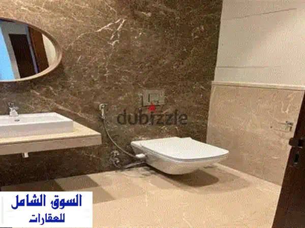 شقة فاخرة للبيع ببيفرلي هيلز سوديك الشيخ زايد | 196م تشطيب كامل وتكييفات بموقع مميز | جاهزة للسكن الفوري 4